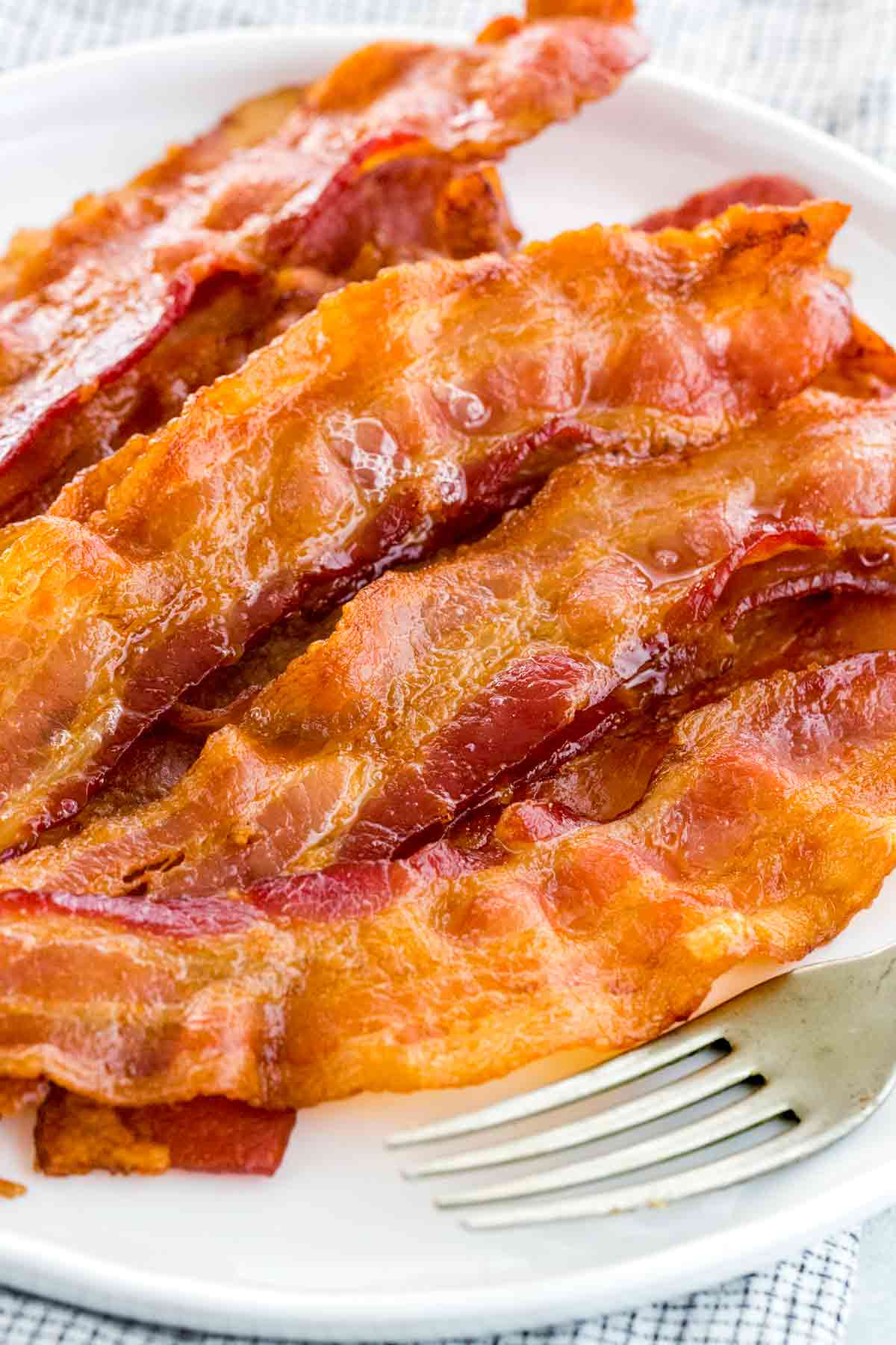 Sizzling And Smoky: How To Cook Bacon In The Oven For A Mouthwatering Meal